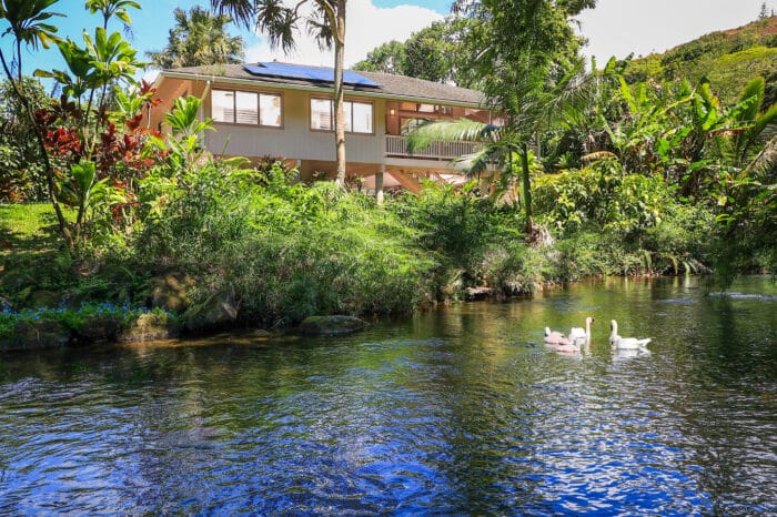 Serene Kauai vacation rental at The Guest House with river view and lush surroundings