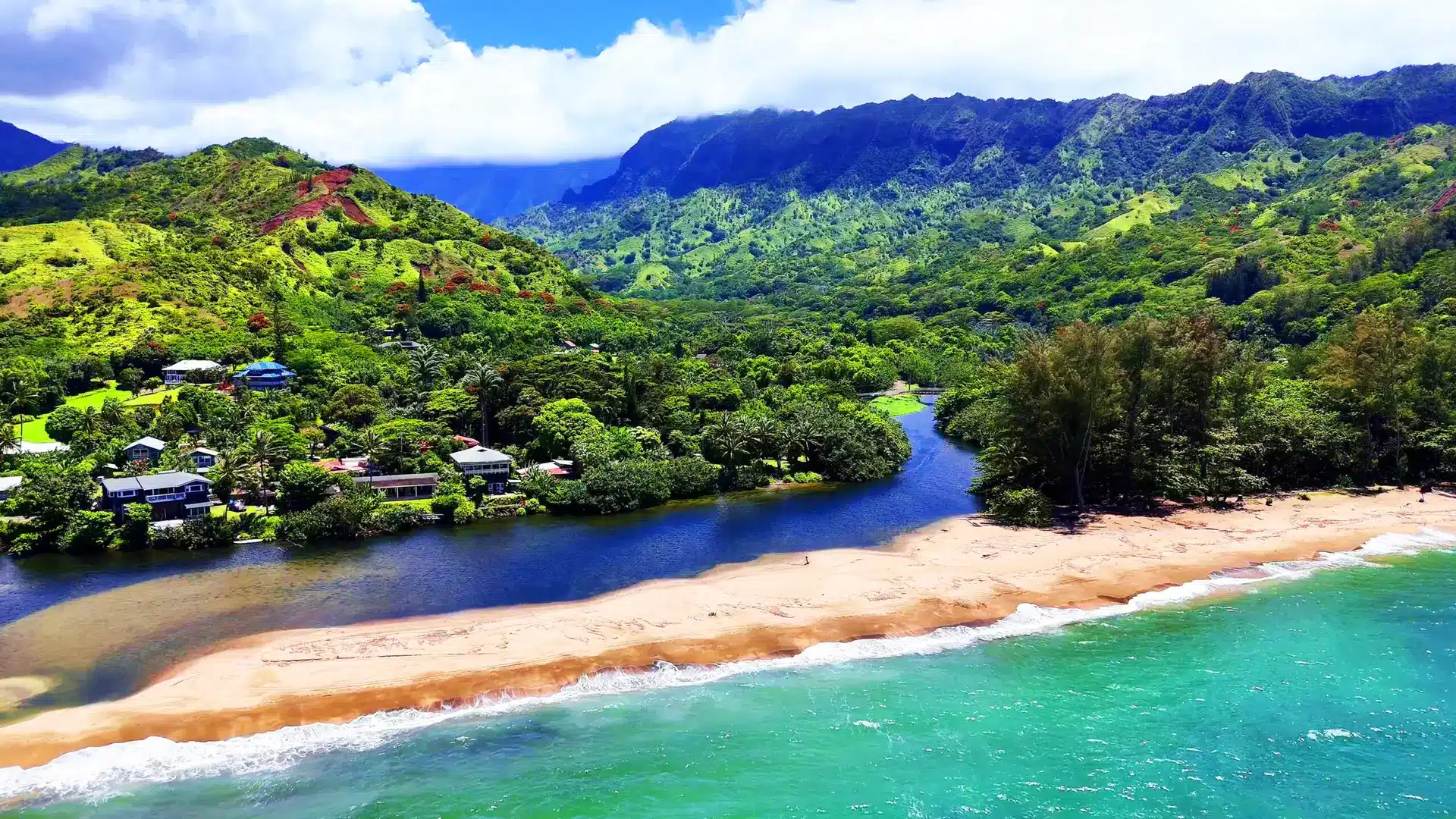 Scenic view of river, ocean, and mountains at the location of The Guest House and The River House, River Estate, Kauai