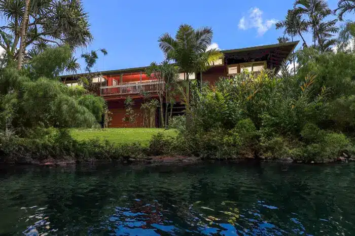 Luxurious Kauai vacation rental at The River House with riverfront views, Tommy Bahama furnishings, and modern amenities