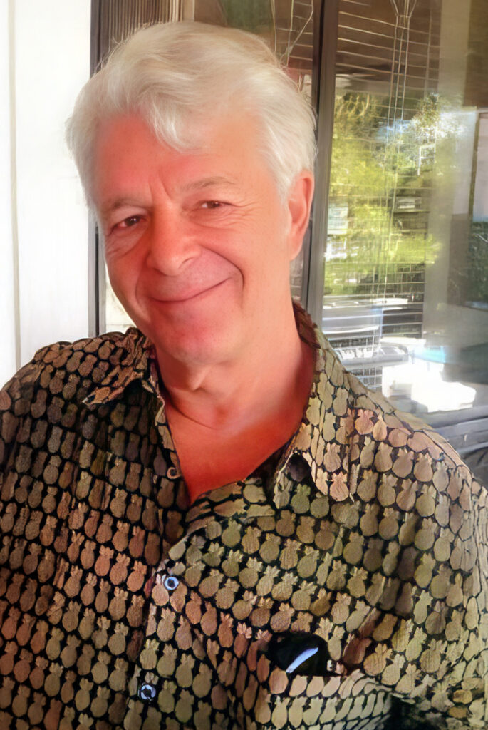 Mark Barbanell, host of River Estate Kauai, standing in tropical garden