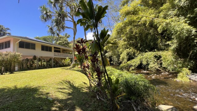 Discover the beauty of River Estate, Kauai, with lush greenery and a serene river creating the perfect vacation retreat. Discover Tranquility and Beauty at River Estate