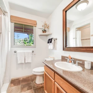 River Estate — Kauaʻi North Shore Vacation Rental | Gallery Modern bathroom at The Guest House, River Estate, with stylish design and quality fixtures