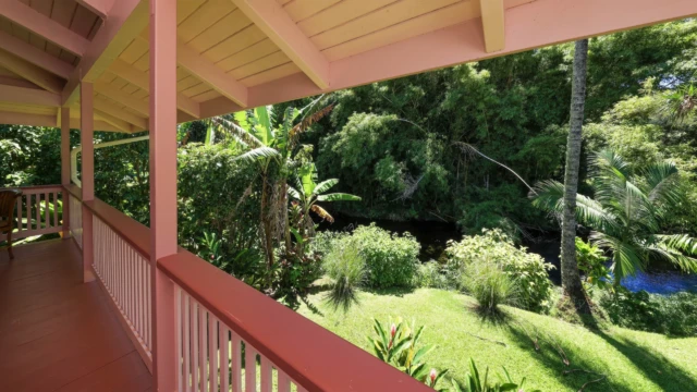 Enjoy the serene river and lush greenery from the deck of The Guest House at River Estate, Kauai. Serene River Views from the Deck