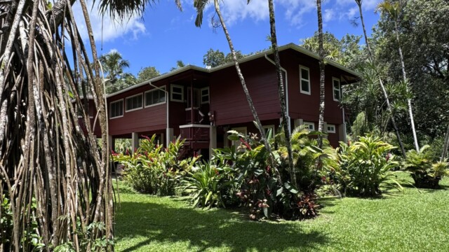 Enjoy the scenic river view and lush greenery at The River House, River Estate, Kauai. Scenic River View Surrounded by Lush Greenery